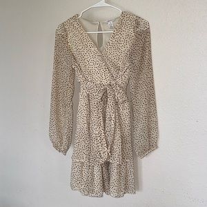 Cream colored dress with light brown polkadots